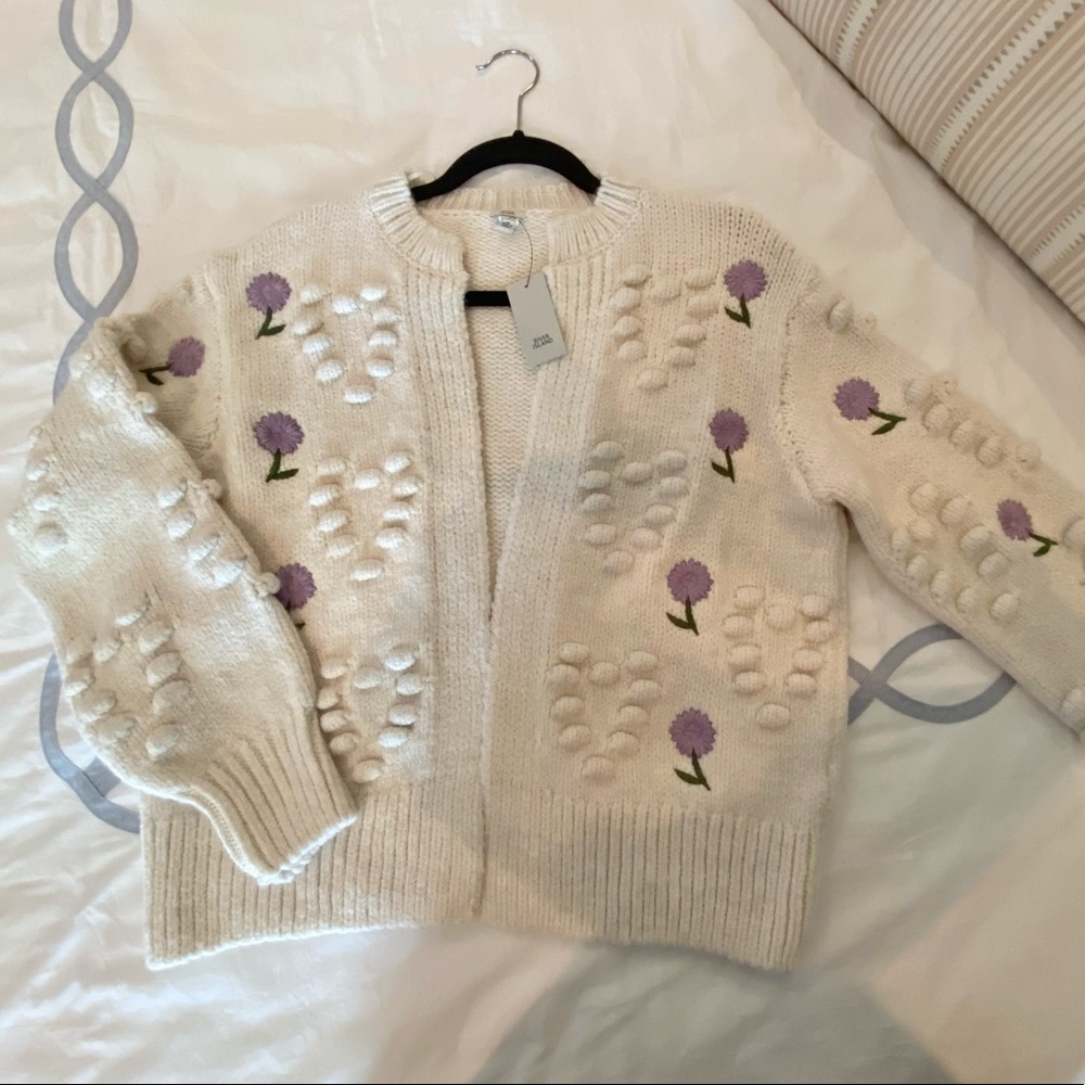 Ivory/cream chunky knit cardigan with purple embroidery detail